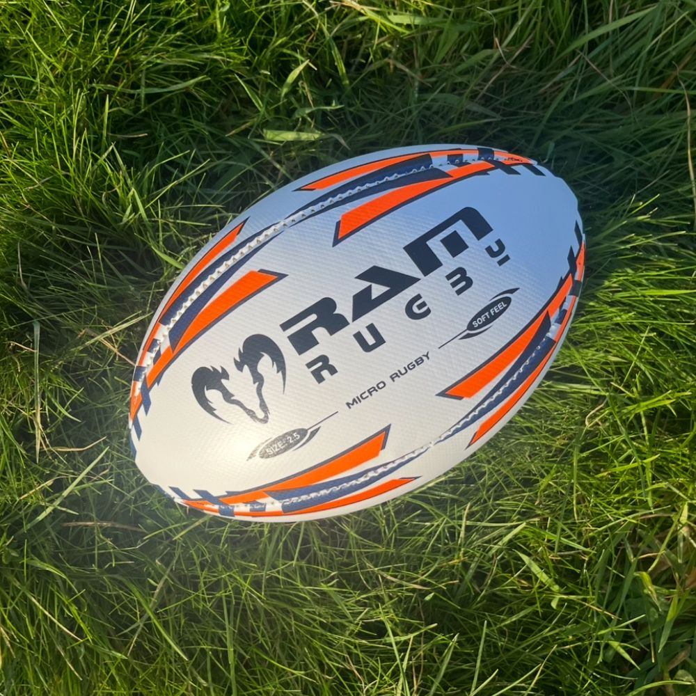 Ram Rugby Micro Soft Feel Training Rugby Ball Size 2.5 in bright colors with soft padded PVC, ideal for kids aged 4-6 years.