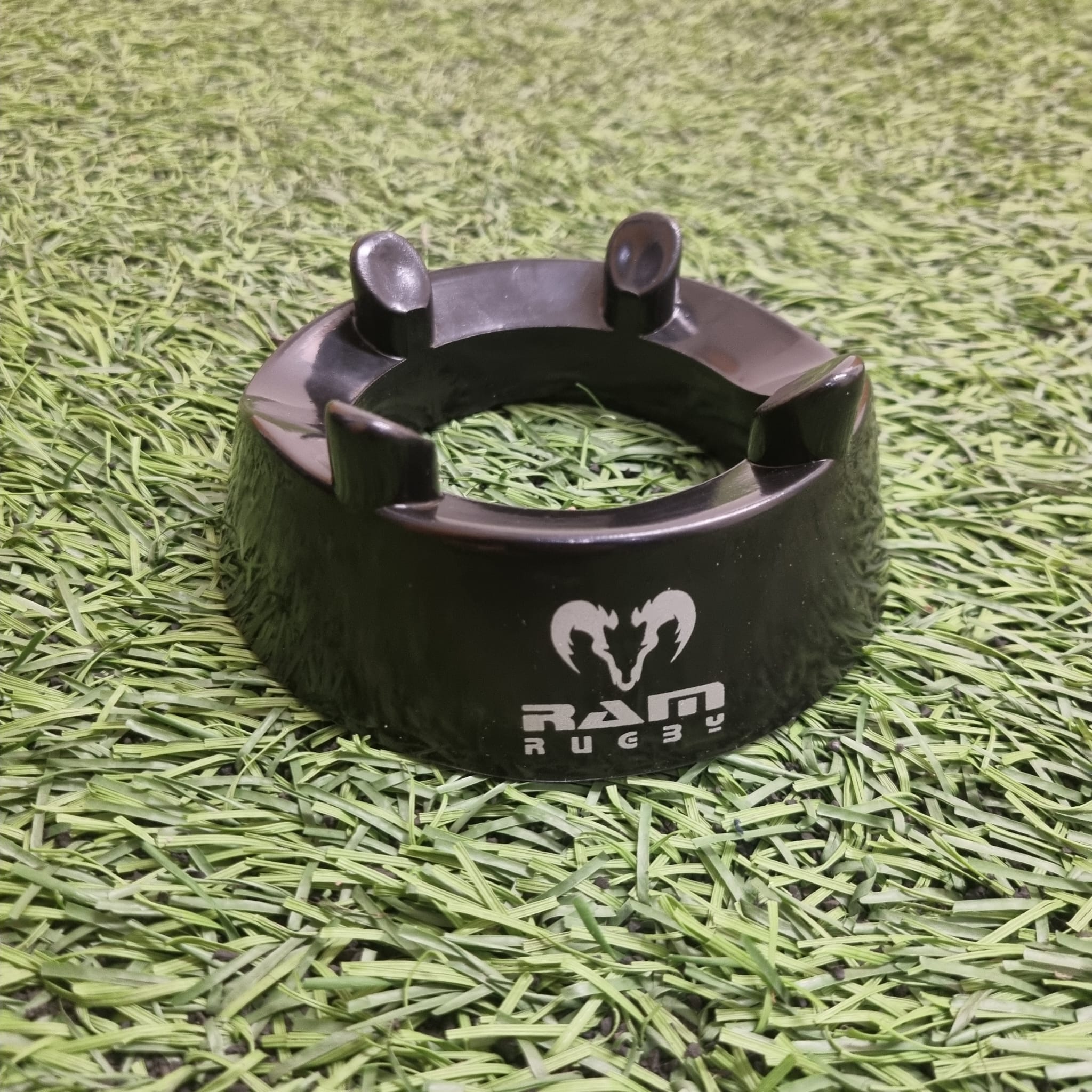 Ram Rugby black durable kicking tee with four-pronged 4cm height design for stable, accurate rugby place kicks and training