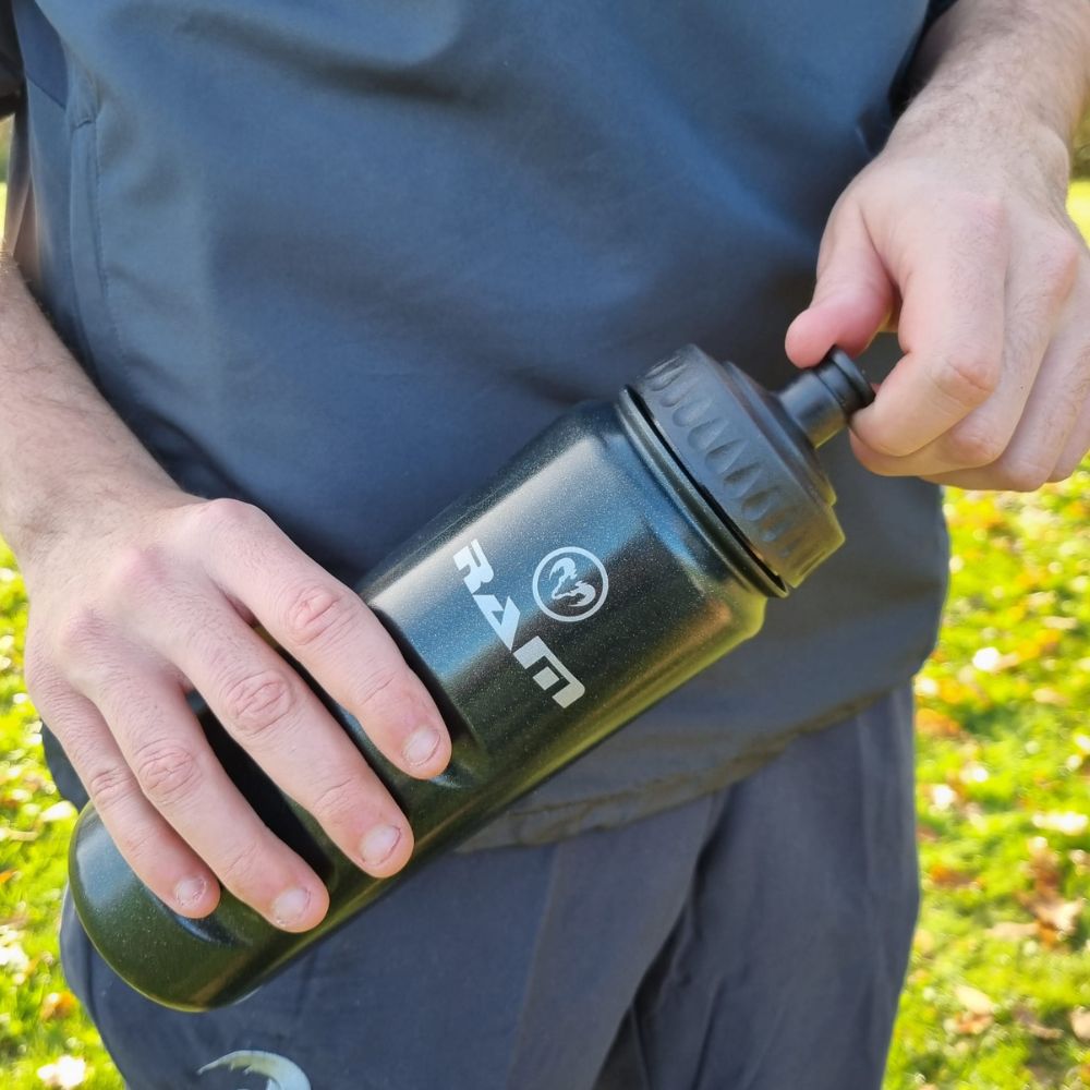 Ram Rugby black ergonomic 750ml water bottle with push-pull lid and screw cap designed for sports hydration and training
