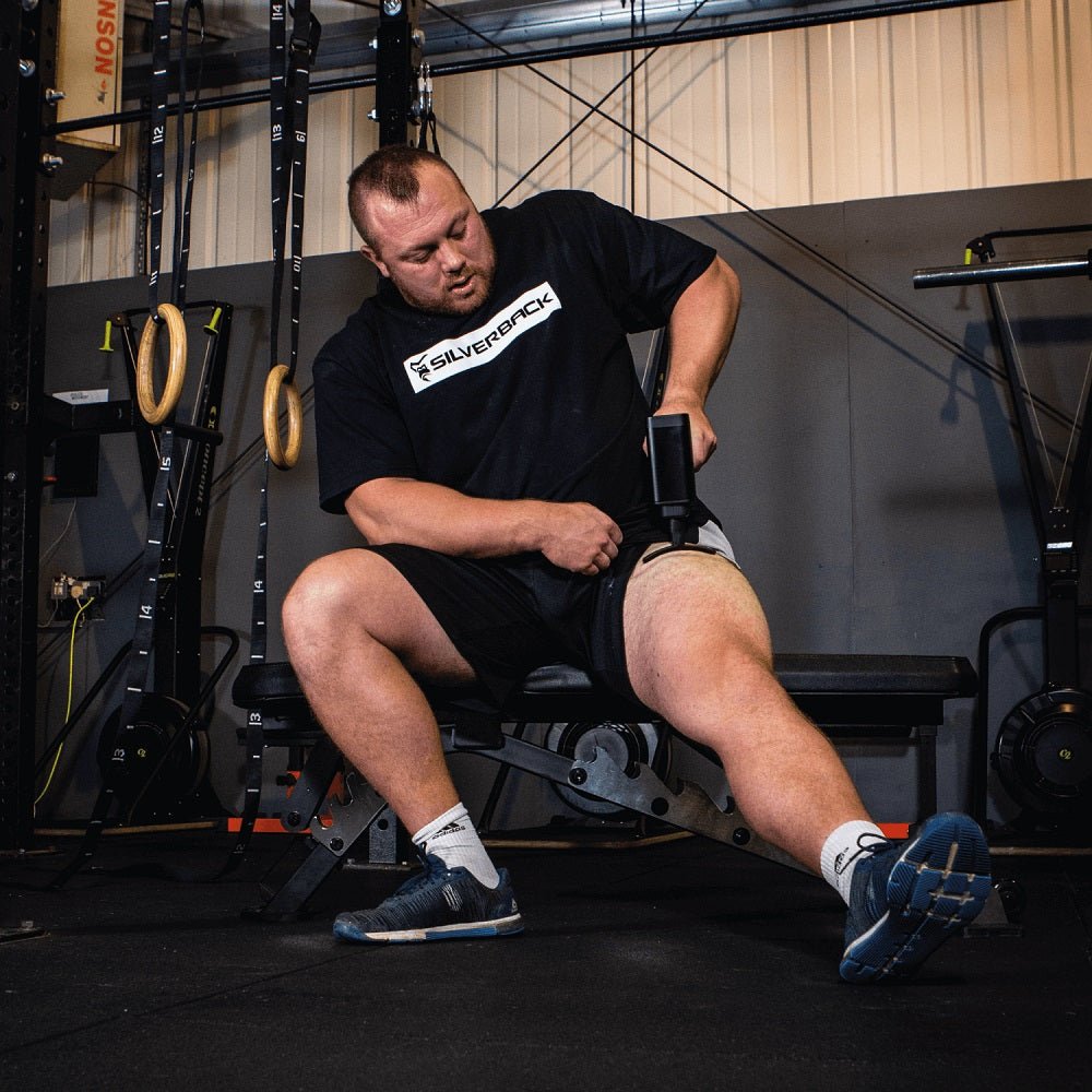 Power Plate MyoPro Massage Gun shown with ergonomic grip and adjustable speed for deep muscle recovery and pain relief