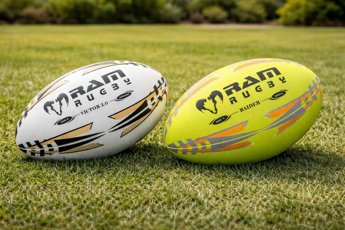 Premium match rugby ball next to a budget training ball