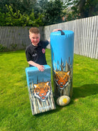 Ram Rugby 8kg kids tackle bag with animal design, high-density foam, water-resistant PVC, and durable Velcro straps.