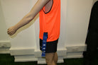 Set of 10 fluorescent orange youth tag rugby bibs with blue PVC tags by Ram Rugby, durable polyester mesh training gear