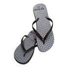 Ram Rugby durable rubber flip flops shown in black with textured sole, designed for easy adult and youth rugby boot removal.