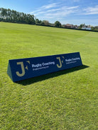 Ram Rugby high-visibility custom advertising corner flag foam wedge in bright yellow, designed for rugby field branding and safety.