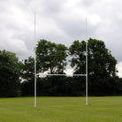 Ram Rugby 10m aluminium white rugby goal posts with fixed socketed design, two-piece uprights and crossbar set