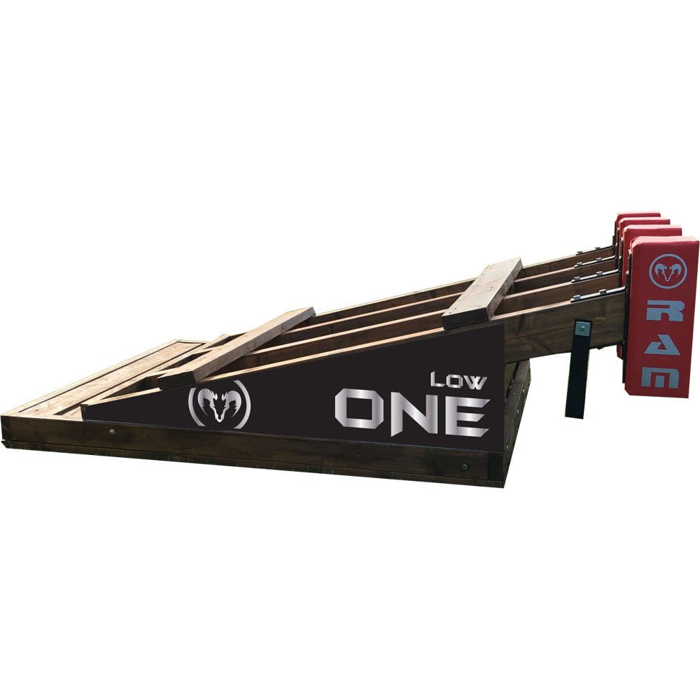 Ram Rugby Low One Scrum Machine in action on rugby field, designed for elite training with durable steel frame and padded impact areas