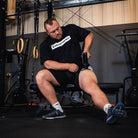 Power Plate MyoPro Massage Gun shown with ergonomic grip and adjustable speed for deep muscle recovery and pain relief