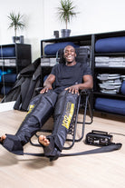 Myomaster MyoPump Compression Leg Massage device showing adjustable straps and ergonomic design for muscle recovery and blood flow