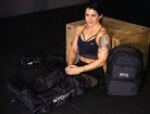 Myomaster MyoPump Compression Leg Massage device shown wrapped around legs, promoting muscle recovery and pain relief
