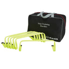 Six bright orange Ram Rugby agility hurdles arranged on green grass for speed and footwork training in sports practice.